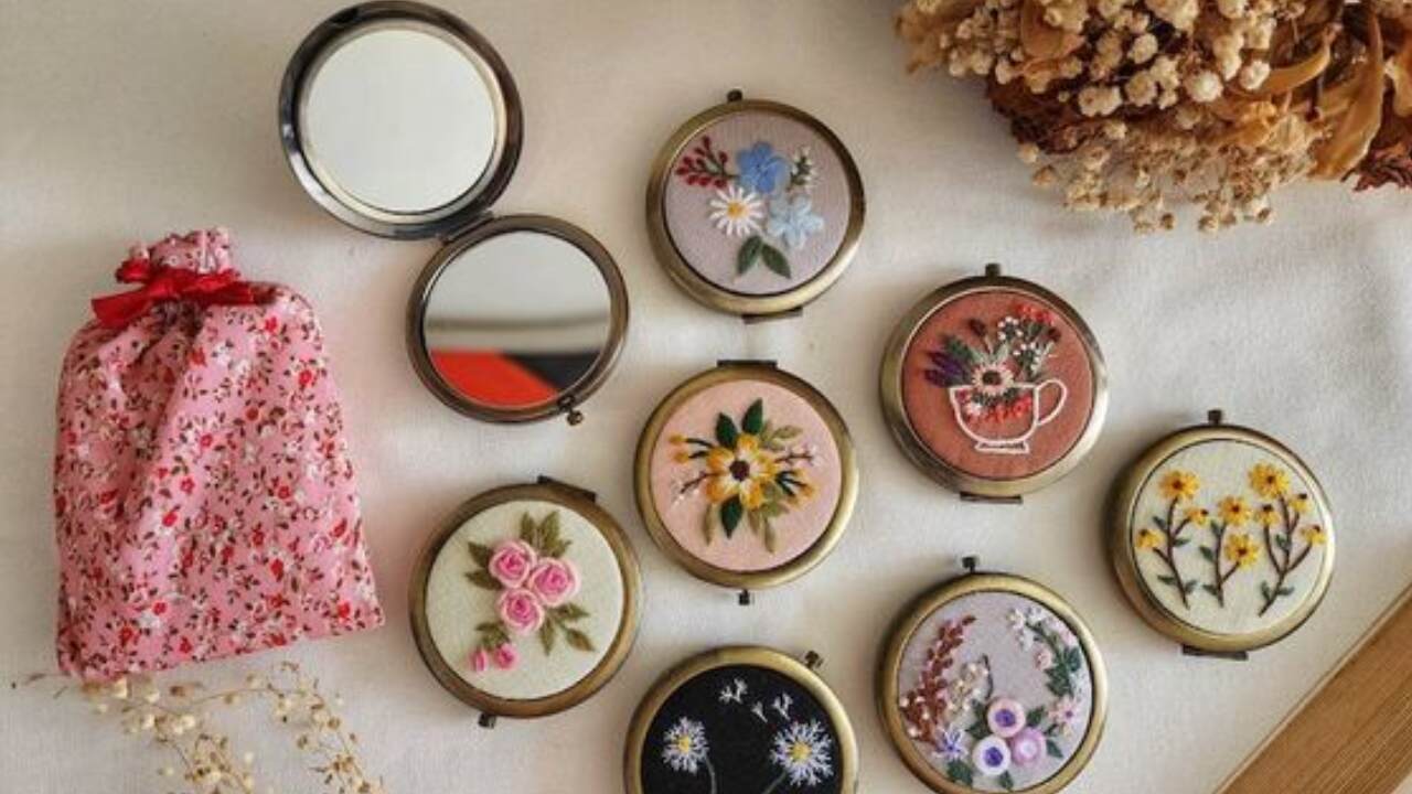 Delicate floral embroidered compact mirror