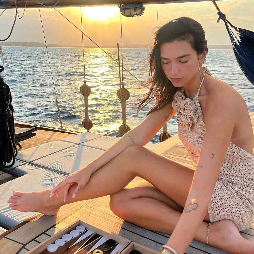 Dua Lipa in a mini crochet dress