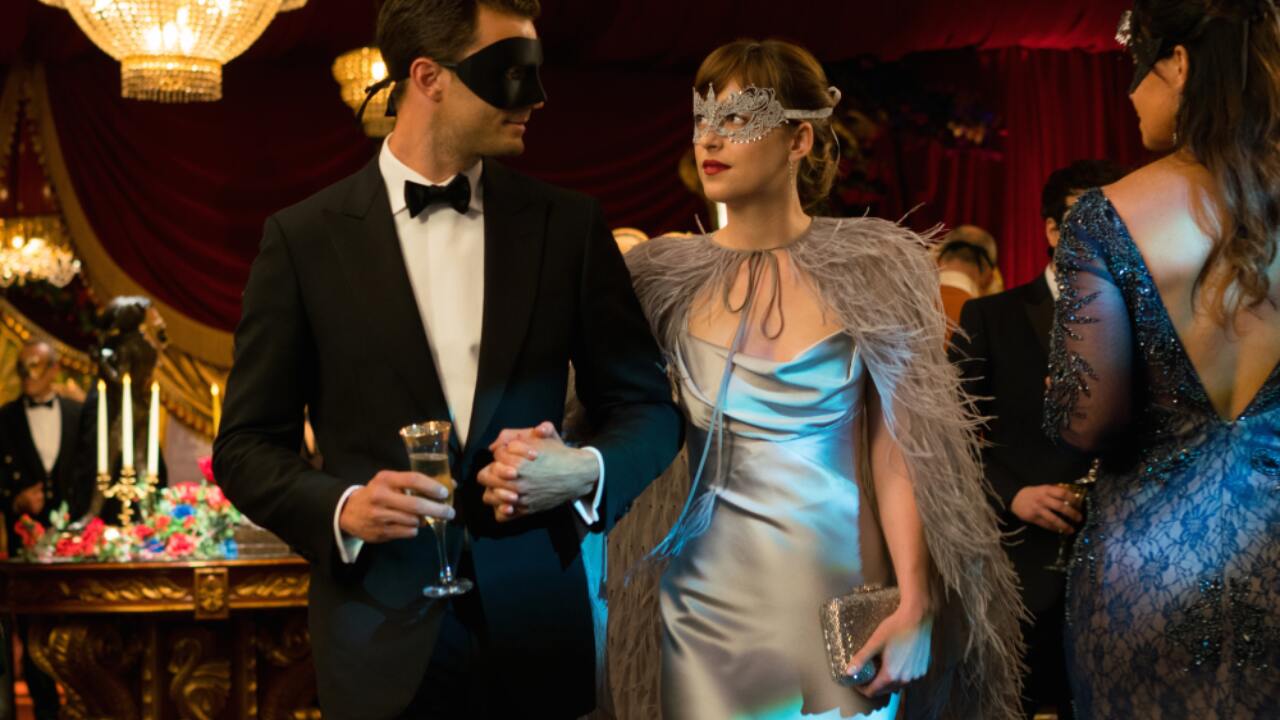 silver gown with a fur coat
